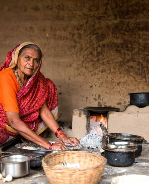 old-woman-making-cooking-baking-fresh-food-rural-village-vintage-kitchen (1)-min